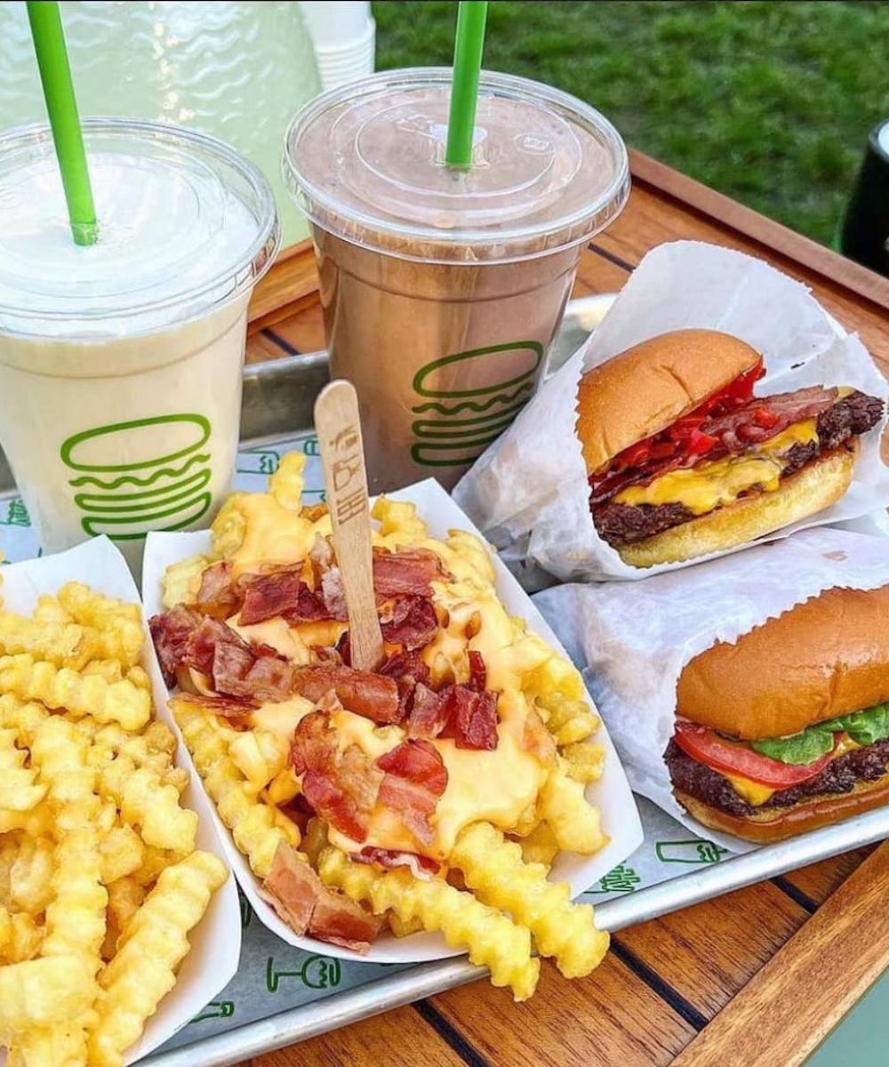 Shake Shack (NYSE: SHAK) Faces Downgraded Outlook Amidst Soft Sales and Increased Competition