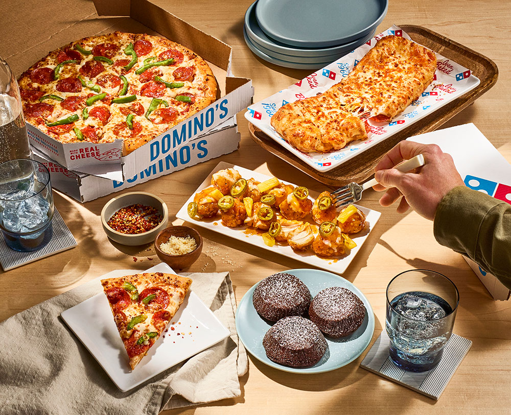 Domino’s Pizza (NASDAQ:DPZ) Q3 Earnings: Navigating Competition and Stock Performance